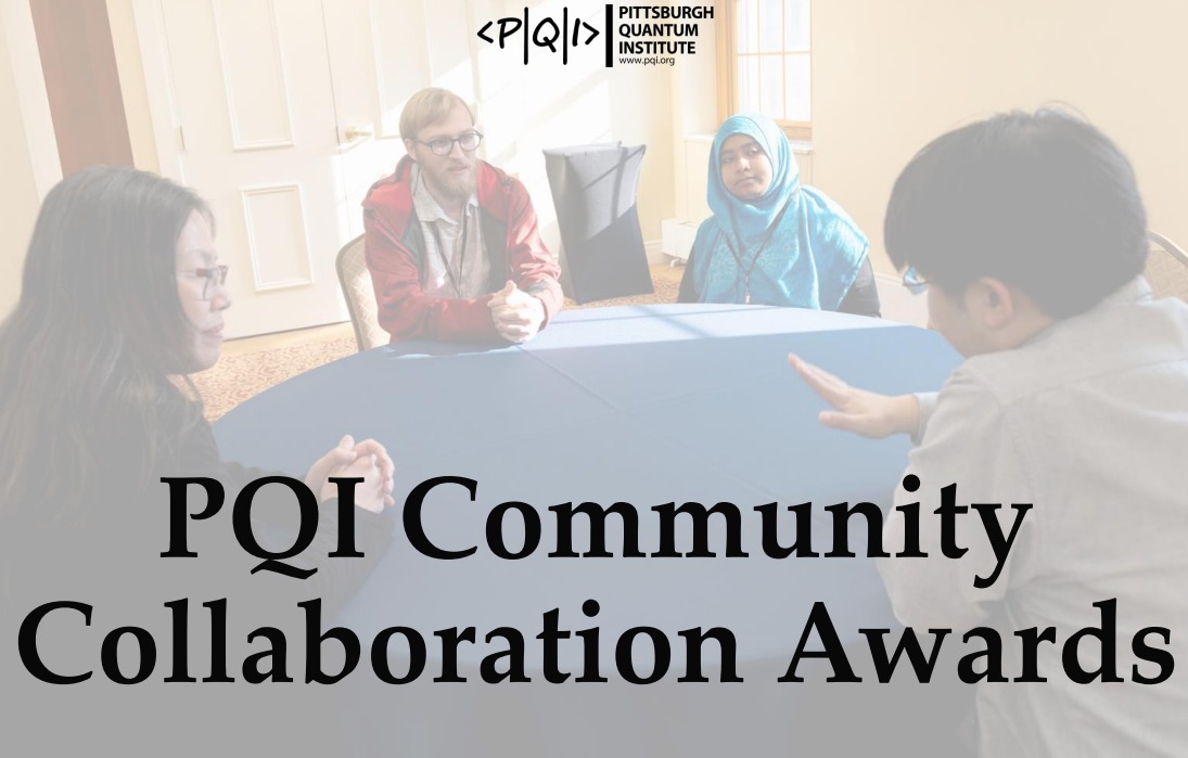 members discuss research at round table.