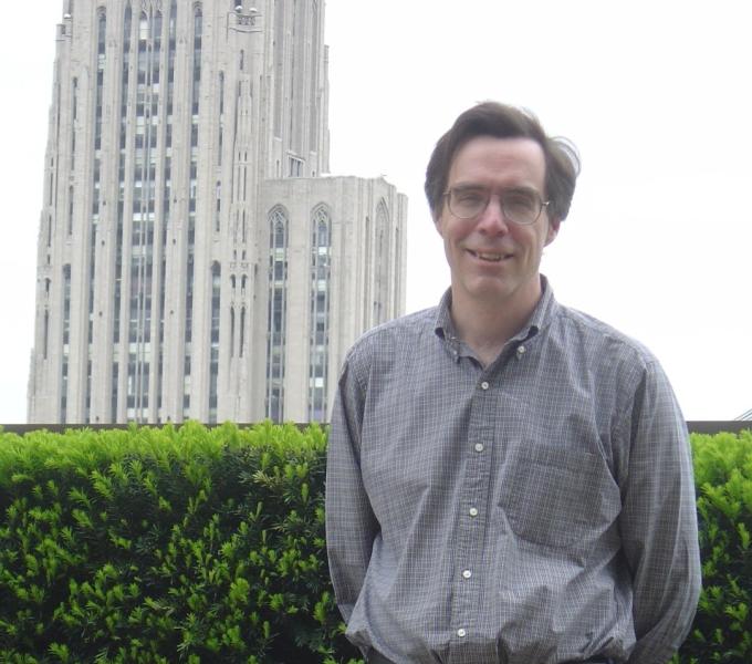 David Waldeck stands in front of Cathedral