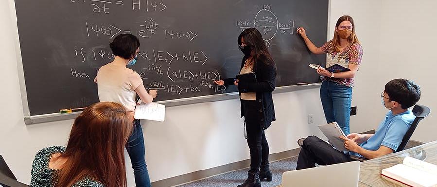 Students working on quantum research