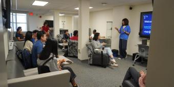 students listening to speaker