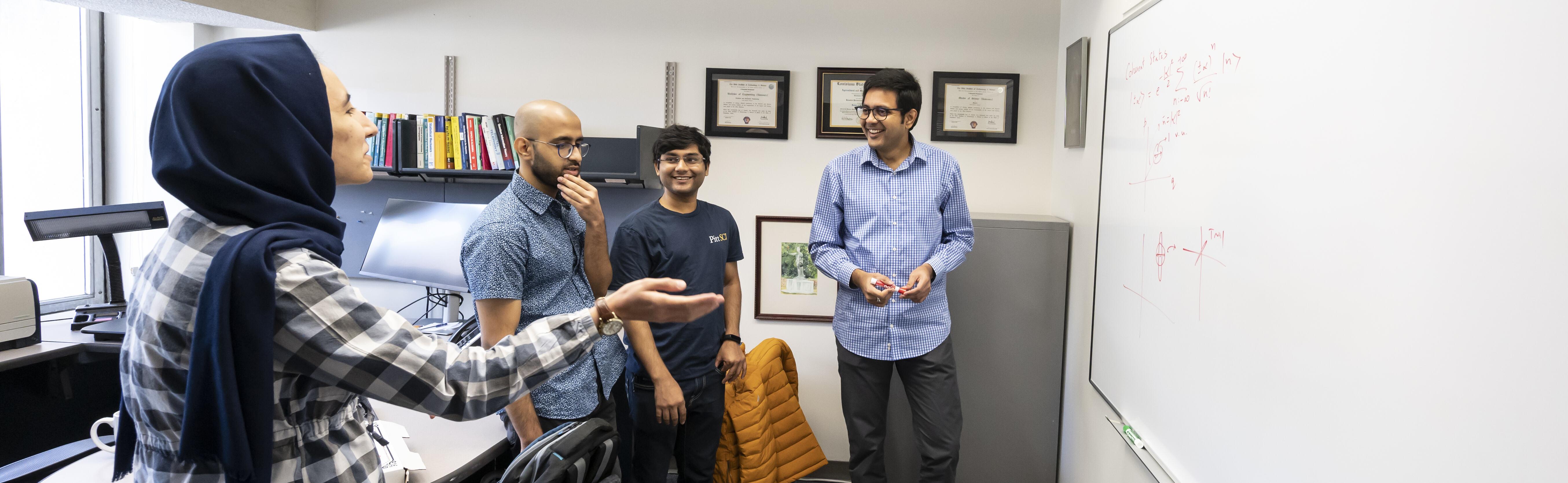 Dr. Seshadreesan and students. 