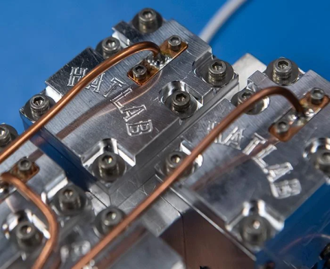 Two quantum computer parts labeled "Hatlab"
